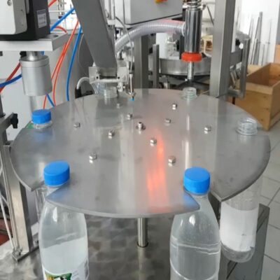 Automatic monoblock filling cap screwing machine for packaging liquid products