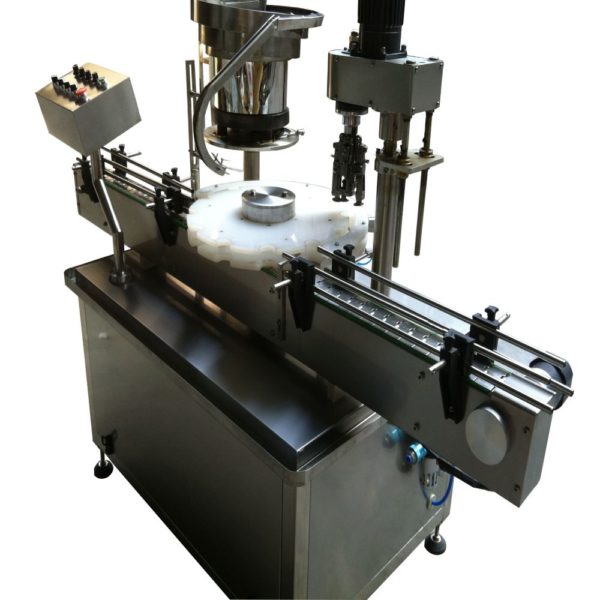 Automatic rotary capping machine for metallic pilferproof PFP, UT, and with or without flow regulator caps for glass bottles of olive oil, wine, ouzo, tsipouro, drinks